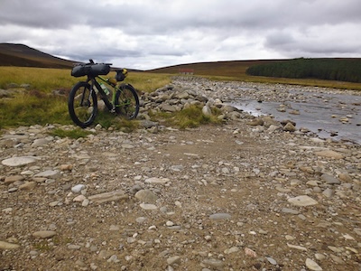 Looking back at the Geldie Burn. The building in the background is now the Red House bothy.