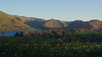The way ahead in the evening light. Looking over Ullswater to Martindale.