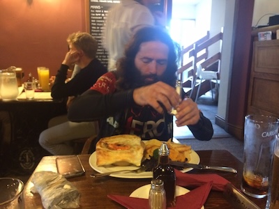 Javi tucking into a well deserved fish pie and chips