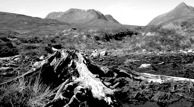 Ben Alder with the two Leacas ridges either side of the sunlit corrie and the Lancet Edge of Sgor Iutharn on the right