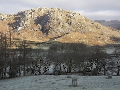 Looking over to Hare Crag from a still frosty valley floor.